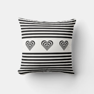 Concentric hearts on black & white striped throw pillow