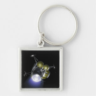 Concept of a crew blasting off keychain