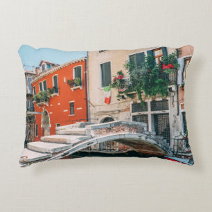 CONCRETE BRIDGE BESIDE WHITE BUILDING ACCENT PILLOW