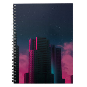CONCRETE BUILDINGS NEAR WHITE CLOUDS NOTEBOOK