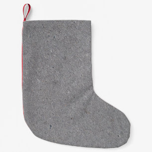 Concrete gray background texture small christmas stocking