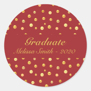 Confettis dorés sur autocollant de graduation roug