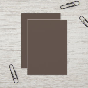 Confidently Against a Stylish Brown Wall Business Card