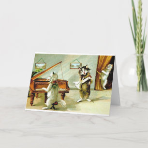 Considérant vintage de piano de chat et carte de