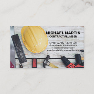 Construction Hand Tools on Wood Table Business Card