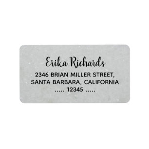 contact address with handwritten name on pale grey label