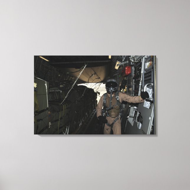 Container Delivery System bundles exit a C-17 Canvas Print (Front)