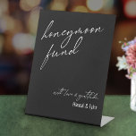 Contemporary Honeymoon Fund QR Code Black Pedestal Sign<br><div class="desc">This collection features an elegant, modern, handwritten font to create key words and phrases. In this piece, the graphic typography overlays read "honeymoon fund" in the large header area and "with love & gratitude" near the bottom. Use the template field to update your names. Feel free to change the background...</div>