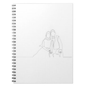 Continuous line drawing of cute romantic couple in notebook