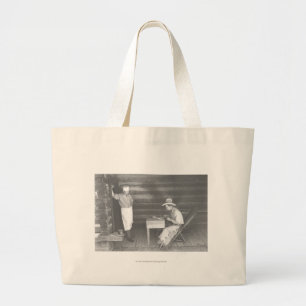 Cook watching a cowboy play cards 2 large tote bag