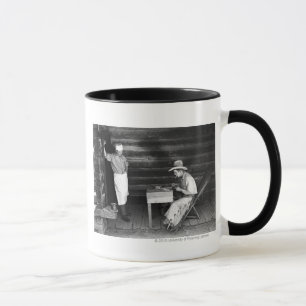 Cook watching a cowboy play cards mug
