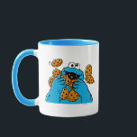 Cookie Monster Eating All the Cookies Mug<br><div class="desc">Satisfy your cravings for fun and cookies with this graphic featuring the one and only Cookie Monster! This showcases a vibrant illustration of Cookie Monster in his element, happily devouring a pile of chocolate chip cookies with crumbs flying everywhere. This classic and instantly recognizable design is cheerful, playful, and sure...</div>