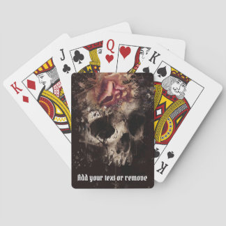 Cool gothic image of a skull and a pink rose, playing cards
