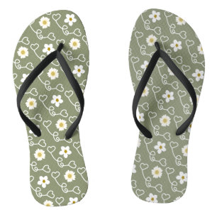 Cool hearts and white flowers on green background flip flops