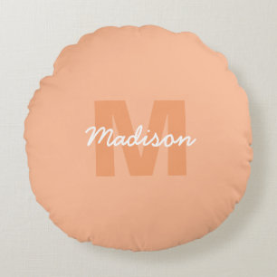 Cool pastel peach colour with Custom Monogram name Round Pillow
