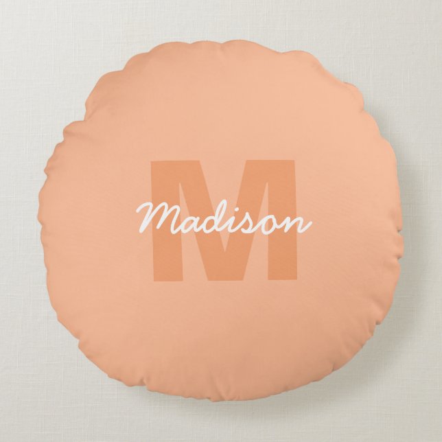 Cool pastel peach colour with Custom Monogram name Round Pillow (Front)