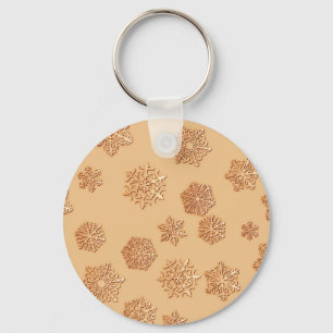 Copper 3-d snowflakes on a copper background keychain