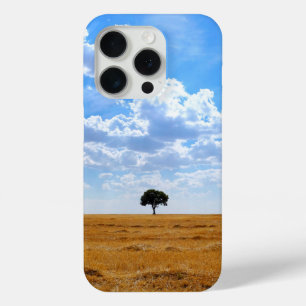 Coque iPhone 15 Pro Arbre dans un champ de blé récolté