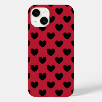 Coeurs de polka noir sur rouge