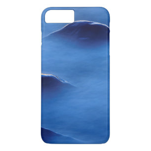 Coque iPhone 7 Plus Coucher de soleil sur des rochers saillants à trav
