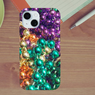 Coque Pour iPhone 15 Pile de Mardi Gras perles moussant dans la lumière