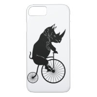 Rhinocéros montant un vieux vélo de mode