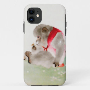 Coque iPhone 11 Un singe posé observant un insecte