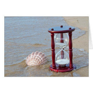 Coquillage et minuterie de sable