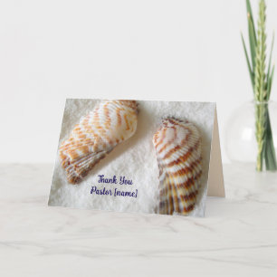 Coquillages dans le Merci de clergé de pasteur de