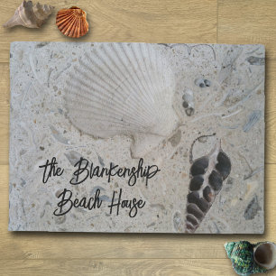 Coquillages dans tapis de sol de maison de plage p