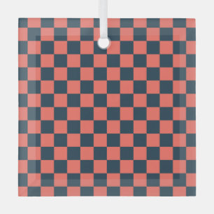 Coral and navy checkerboard pattern glass ornament
