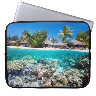 Coral reef and a tropical resort laptop sleeve