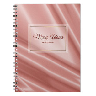 Coral Silk texture. Golden frame. Notebook