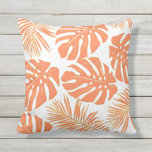 Coral tropical monstera and palm leaves pattern outdoor pillow