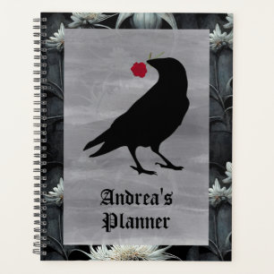 Corbeau gothique tenant rose rouge planner personn