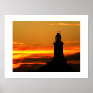 Corbiere lighthouse at sunset in Jersey Poster