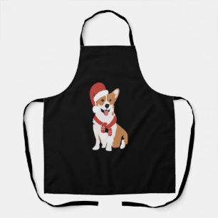 Corgi wearing a santa hat apron