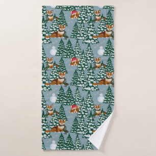 Corgis décorent l'arbre de Noël en bleu de la forê