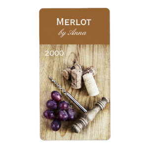 corks, corkscrew and grapes wine bottle label