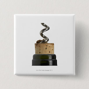 Corkscrew and cork, photographed on white 2 inch square button