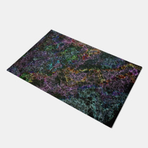 Corroded or destroyed dark coloured sponge doormat