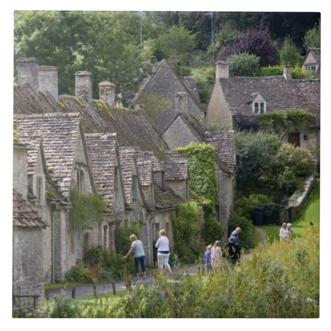 Cotswold stone cottages in the village of tile (Front)
