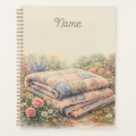 Cottagecore Floral Patchwork Quilt Watercolor Planner<br><div class="desc">A dreamy cottagecore scene unfolds through soft watercolor brushstrokes, featuring a vintage-inspired patchwork quilt surrounded by blooming garden florals. Gentle pastel hues of blush pink, dusty blue, sage green, and buttery cream create a soothing, nostalgic palette that feels both whimsical and serene. The composition evokes cozy countryside charm, blending shabby...</div>