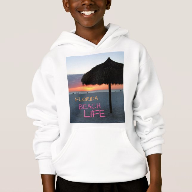 Coucher de soleil sur la plage de sable blanc de F (Devant)