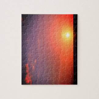 Coucher du soleil sur le puzzle de plage