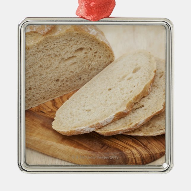 Country Bread (Pain de Campagne) on a chopping Metal Ornament (Front)