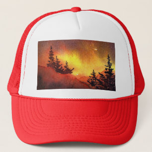 Country pine trees on a hill with a blazing sunset trucker hat