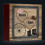 Country Western Rustic Wagon Wheel Wedding Album Binder<br><div class="desc">Country Rustic Wagon Wheel Wedding Photo Album. Two carved hearts where you can add your names,  and 2 pairs of boots for bride and groom. ALL DESIGN ELEMENTS ARE PRINTED, NOT ACTUAL WOOD.</div>