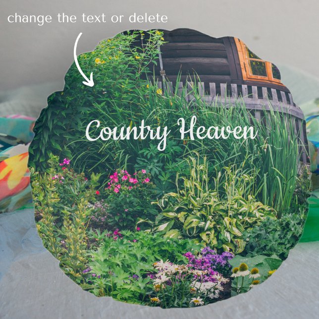 Countryside house with a colourful garden round pillow (Creator Uploaded)