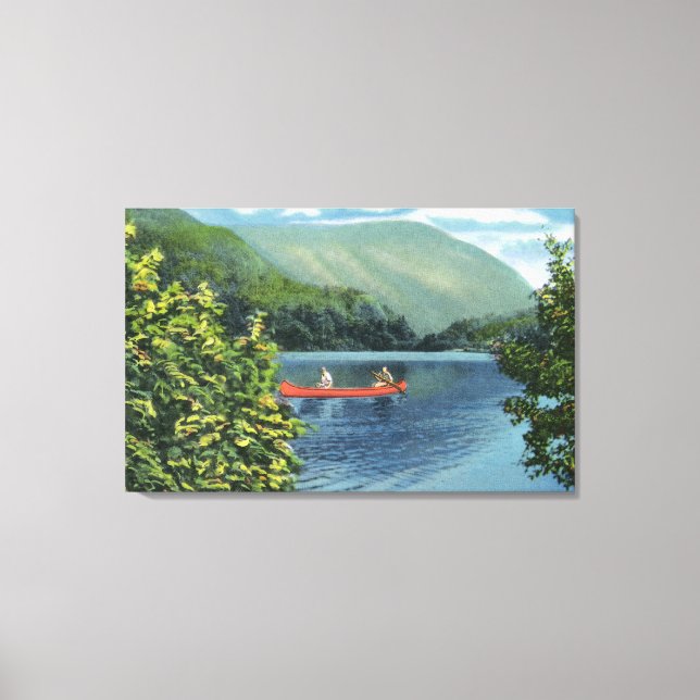 Couple Canoeing on a Lake Canvas Print (Front)